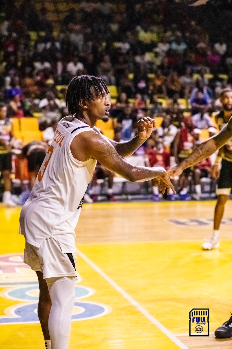 Myke on court in white jersey